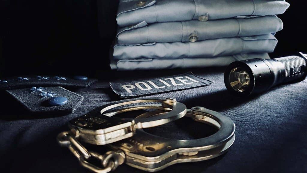 Handcuffs and police uniform. Stranger danger can be police, too. 