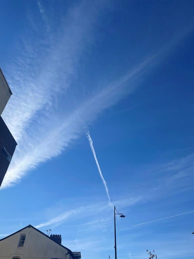 A blue sky with lines in it. 